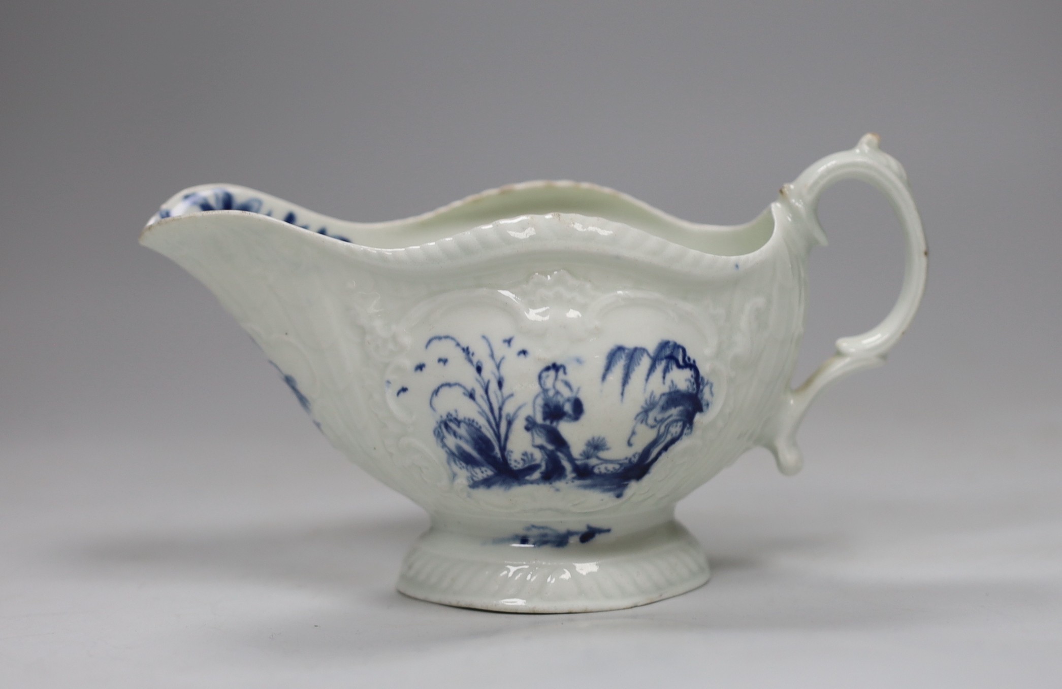 A Worcester ‘fishermen’ pattern sauce boat, 17cm long